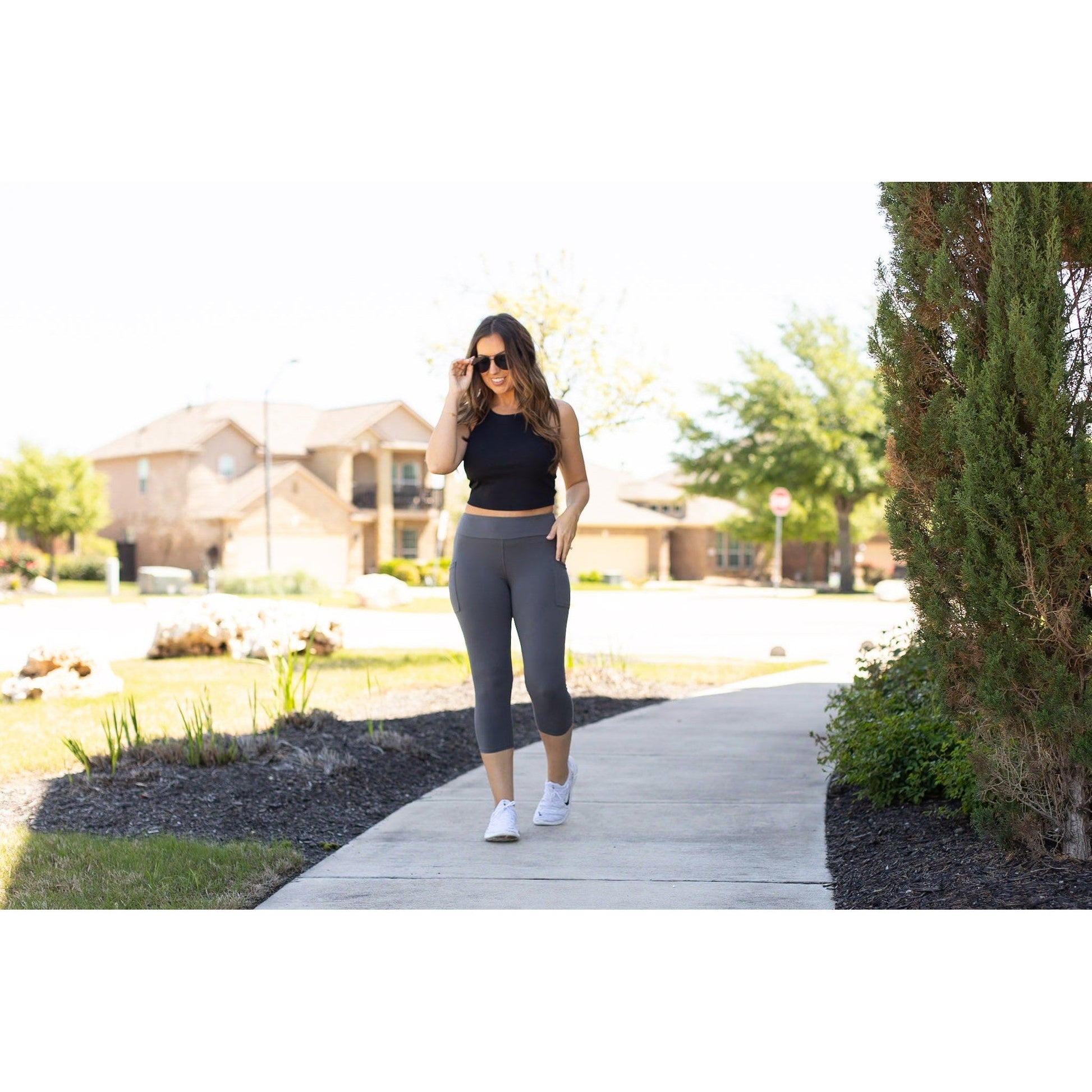 Julia Rose The Dani charcoal capri leggings with pockets, Women wearing charcoal capri pocket leggings