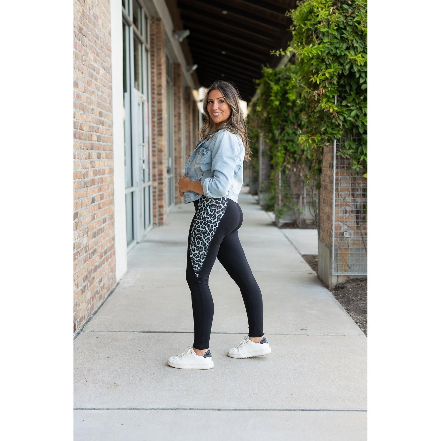 Snow leopard panel detail on  Buttery soft leopard panel leggings for women by Julia Rose