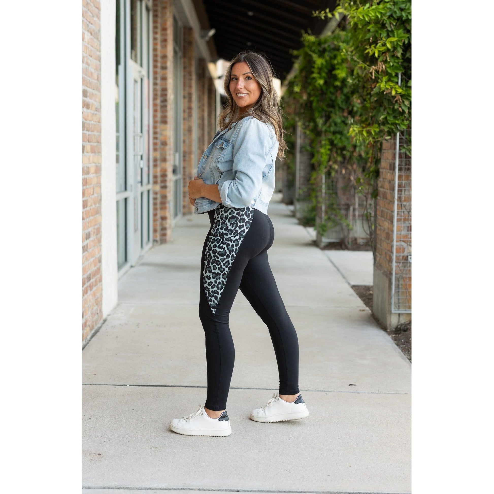 Snow leopard panel detail on  Buttery soft leopard panel leggings for women by Julia Rose