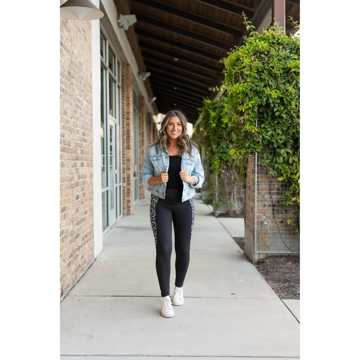 Snow leopard panel detail on  Buttery soft leopard panel leggings for women by Julia Rose