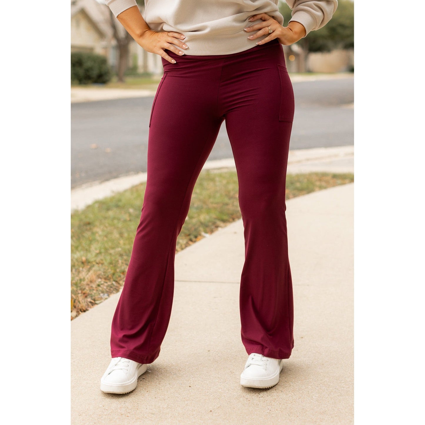 High-waisted maroon bootcut leggings with pockets by Julia Rose, Julia Rose women’s maroon flared leggings lifestyle image