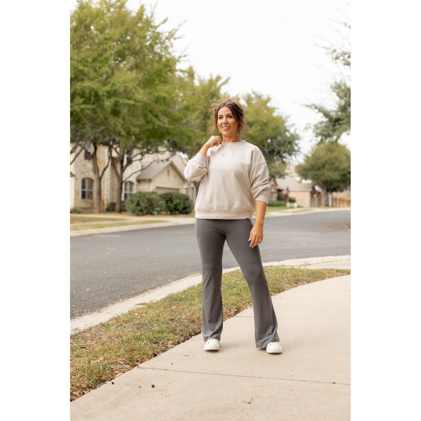 High-waisted charcoal bootcut leggings with pockets by Julia Rose, Julia Rose women’s charcoal flared leggings lifestyle image