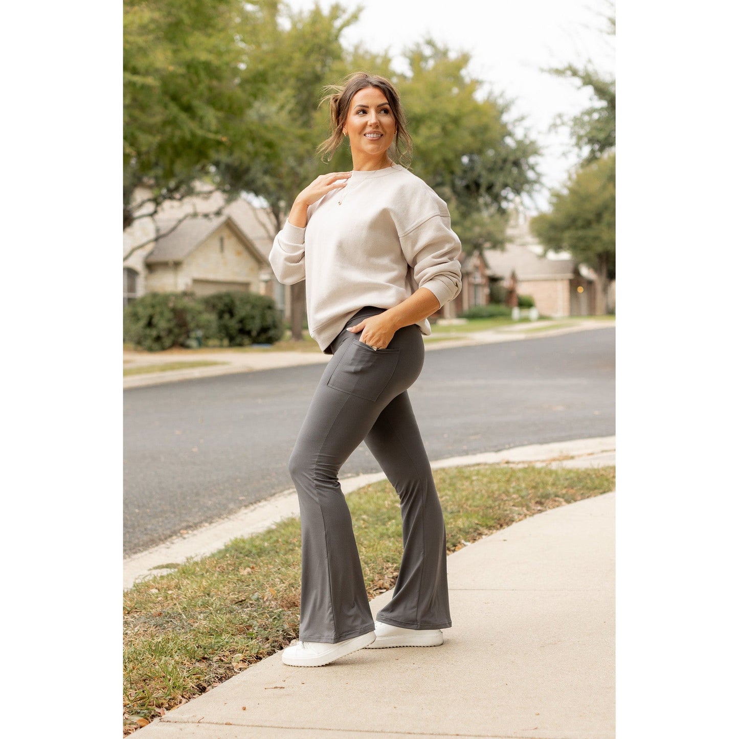High-waisted charcoal bootcut leggings with pockets by Julia Rose, Julia Rose women’s charcoal flared leggings lifestyle image
