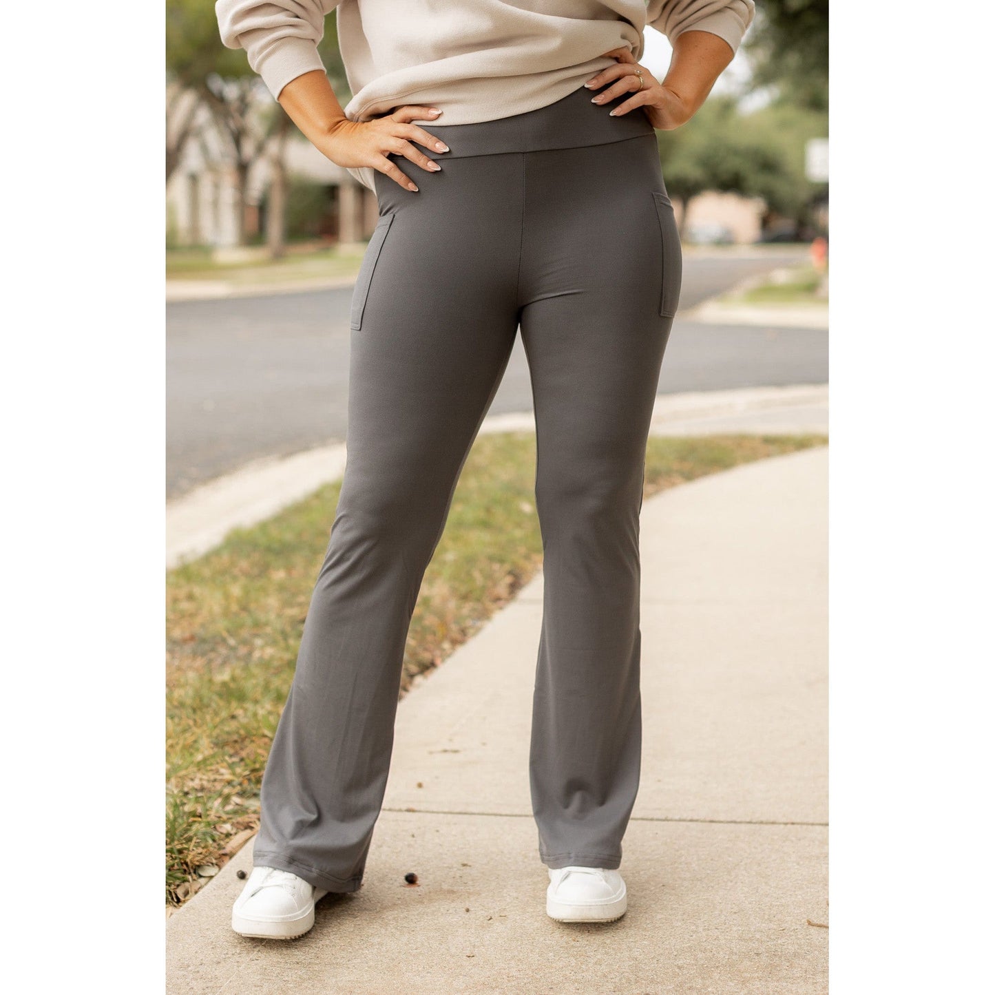 High-waisted charcoal bootcut leggings with pockets by Julia Rose, Julia Rose women’s charcoal flared leggings lifestyle image