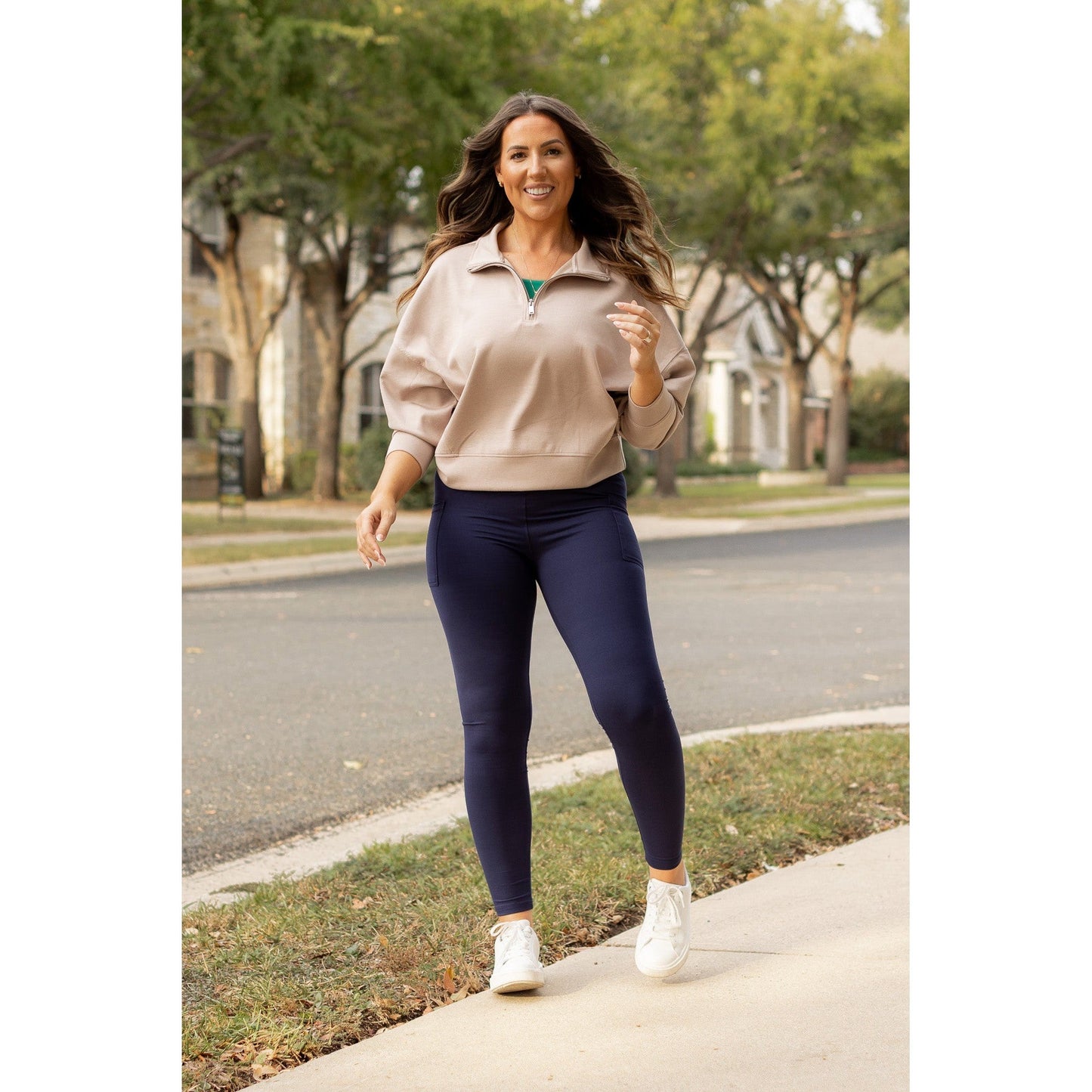 High-waisted navy crossover leggings with pockets by Julia Rose, Julia Rose women’s navy full length leggings lifestyle image