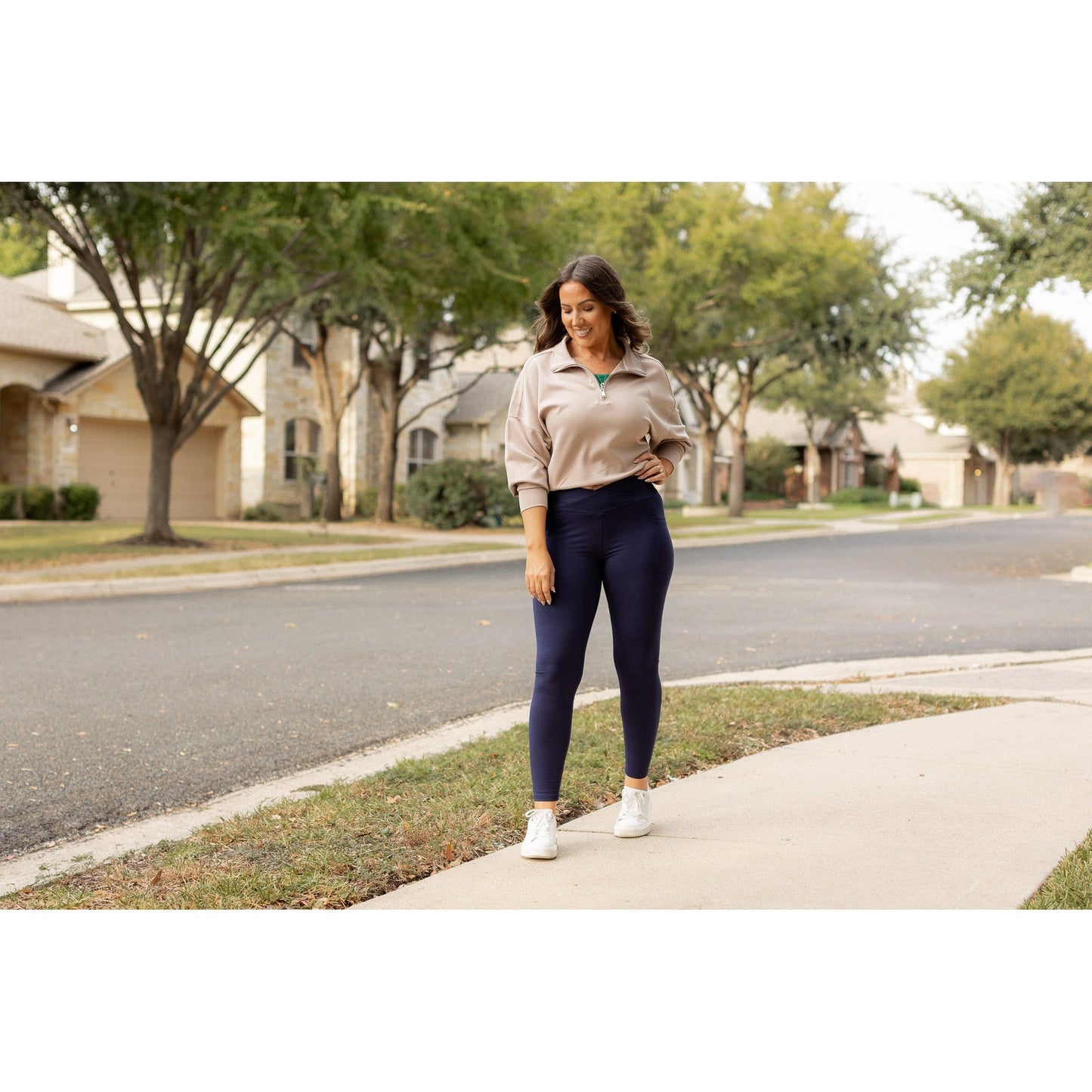 High-waisted navy crossover leggings with pockets by Julia Rose, Julia Rose women’s navy full length leggings lifestyle image