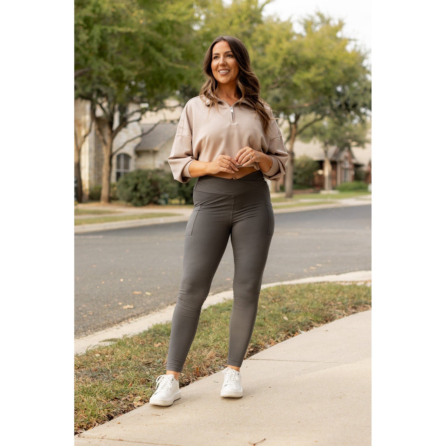 High-waisted charcoal crossover leggings with pockets by Julia Rose, Julia Rose women’s charcoal full length leggings lifestyle image