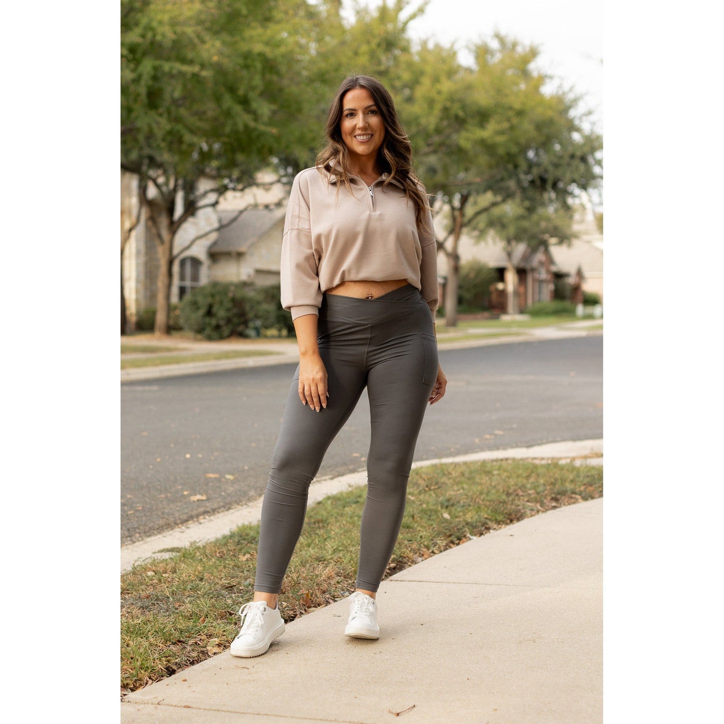 High-waisted charcoal crossover leggings with pockets by Julia Rose, Julia Rose women’s charcoal full length leggings lifestyle image