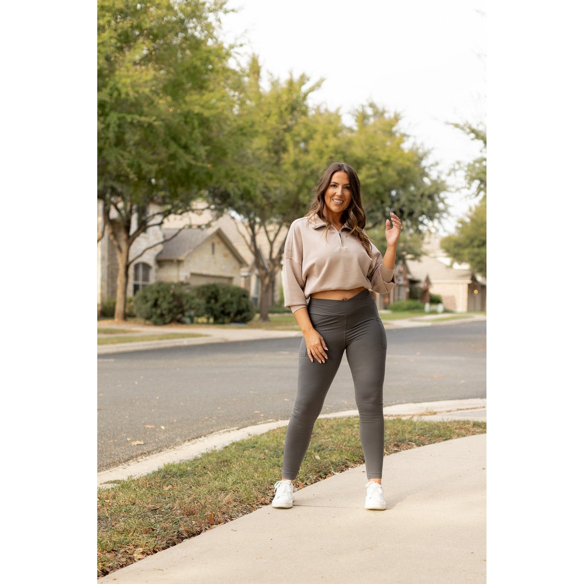 High-waisted charcoal crossover leggings with pockets by Julia Rose, Julia Rose women’s charcoal full length leggings lifestyle image