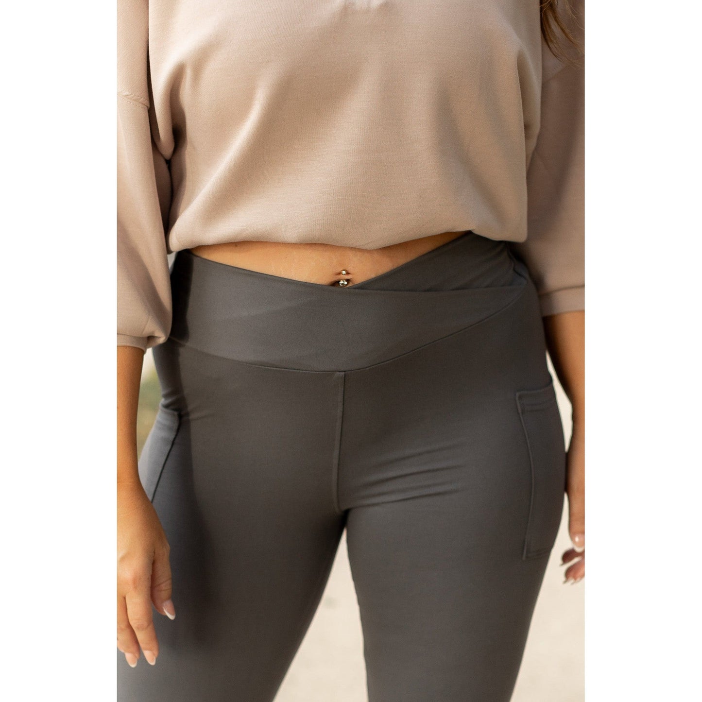 High-waisted charcoal crossover leggings with pockets by Julia Rose, Julia Rose women’s charcoal full length leggings lifestyle image