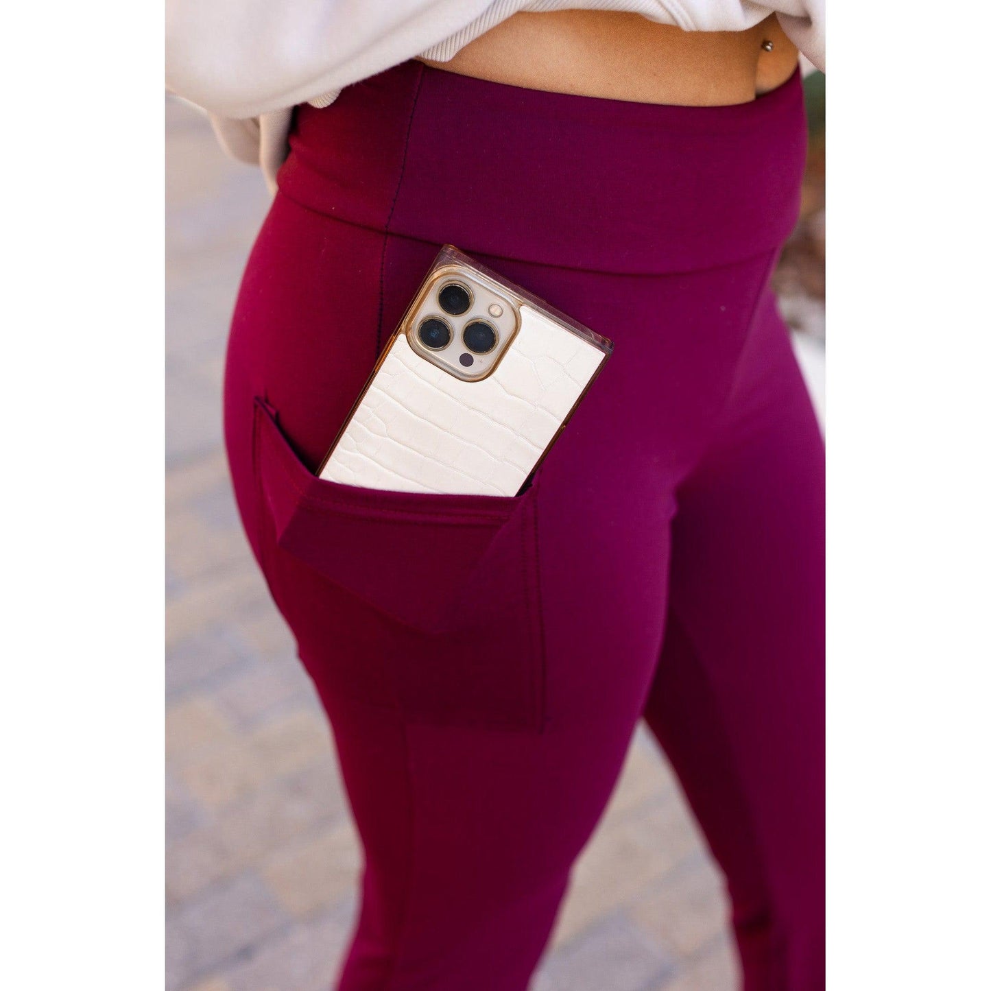 High-waisted maroon bootcut leggings with pockets by Julia Rose, Julia Rose women’s maroon flared leggings lifestyle image
