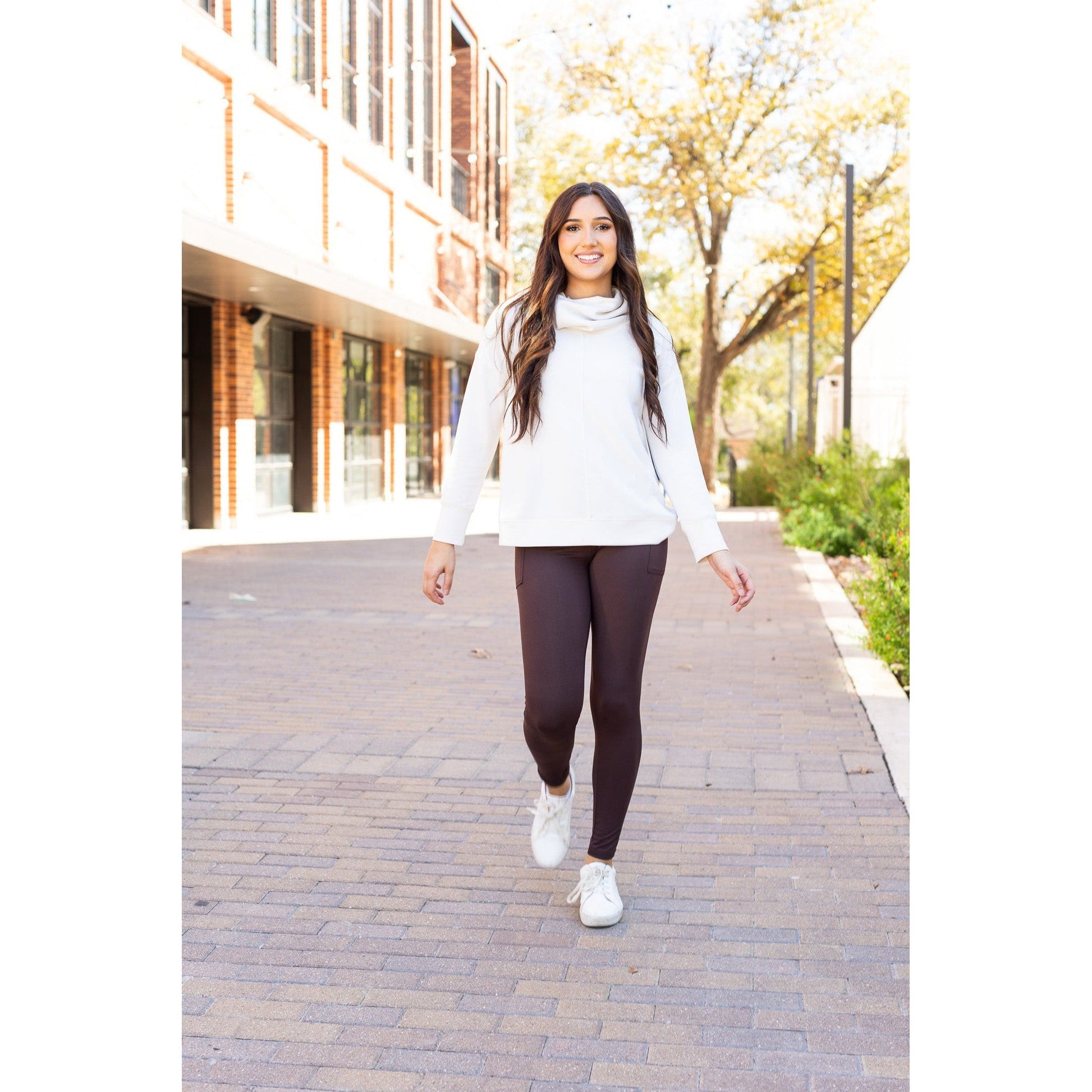 High waist brown crossover leggings for women. Buttery soft brown leggings with flattering waistband
