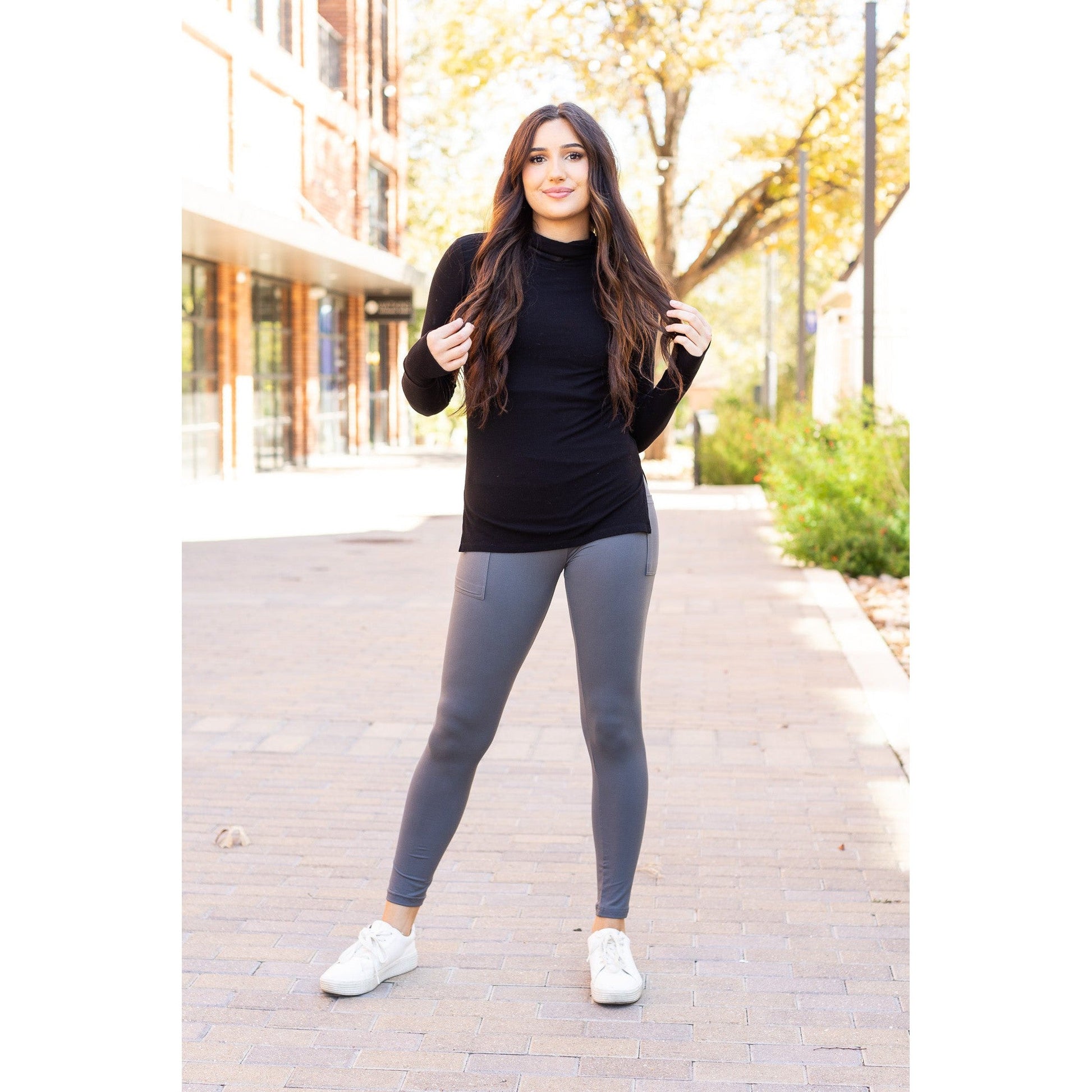 High-waisted charcoal crossover leggings with pockets by Julia Rose, Julia Rose women’s charcoal full length leggings lifestyle image
