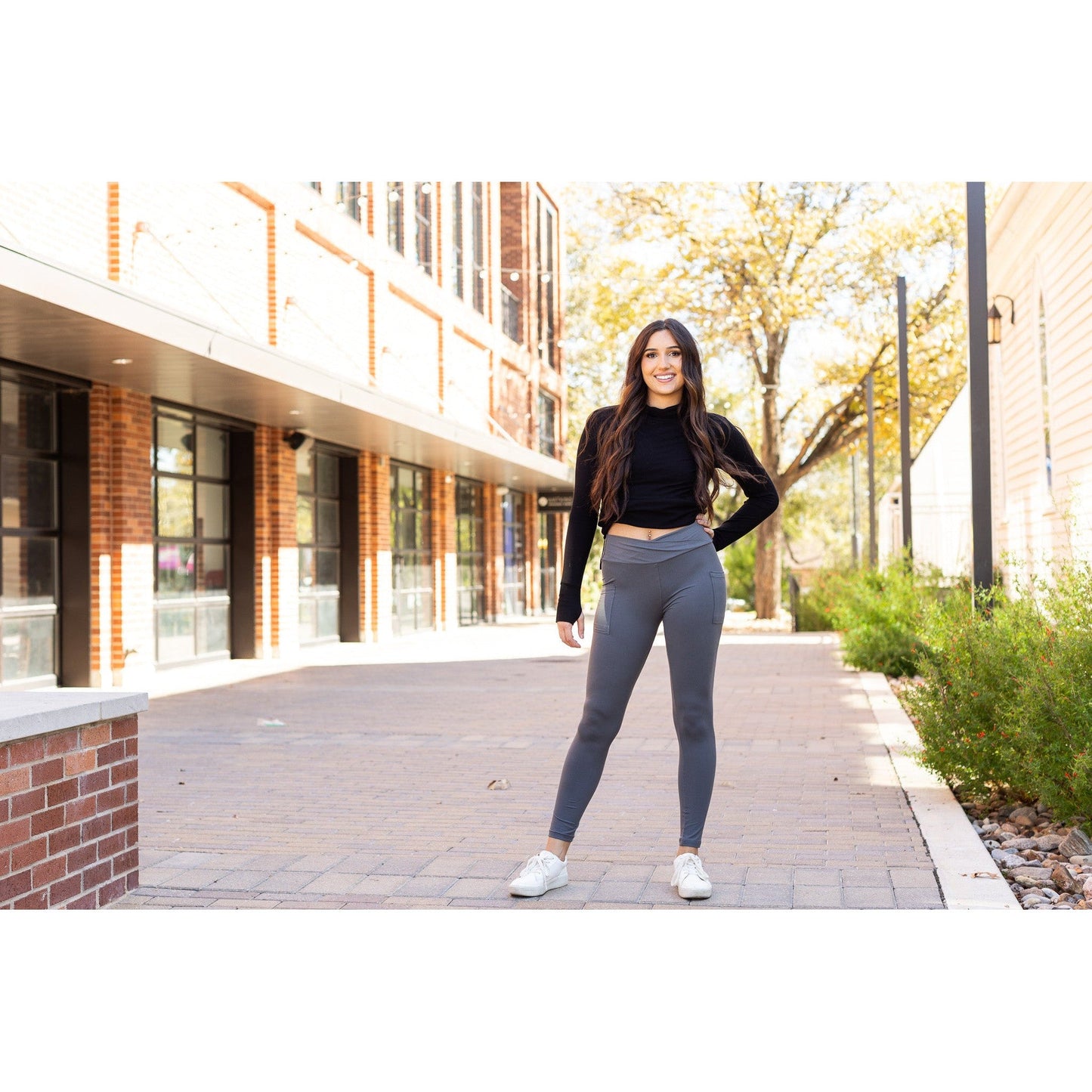 High-waisted charcoal crossover leggings with pockets by Julia Rose, Julia Rose women’s charcoal full length leggings lifestyle image