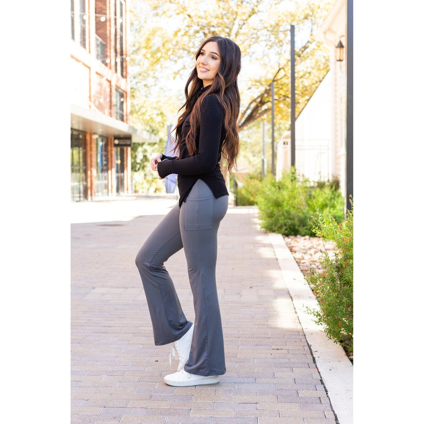 High-waisted charcoal bootcut leggings with pockets by Julia Rose, Julia Rose women’s charcoal flared leggings lifestyle image