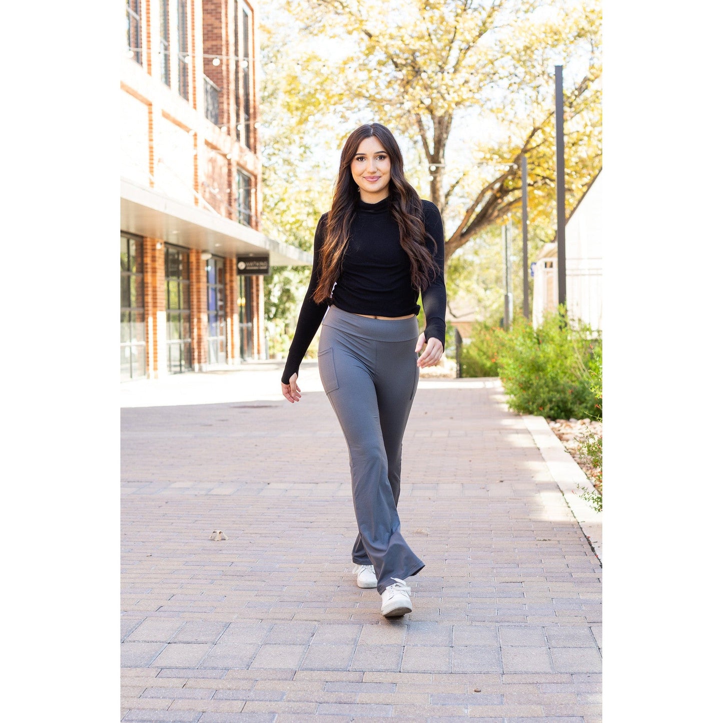 High-waisted charcoal bootcut leggings with pockets by Julia Rose, Julia Rose women’s charcoal flared leggings lifestyle image