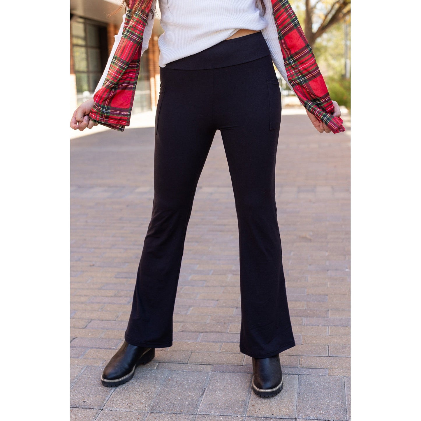 High-waisted black bootcut leggings by Julia Rose, Julia Rose women’s flared black leggings lifestyle image