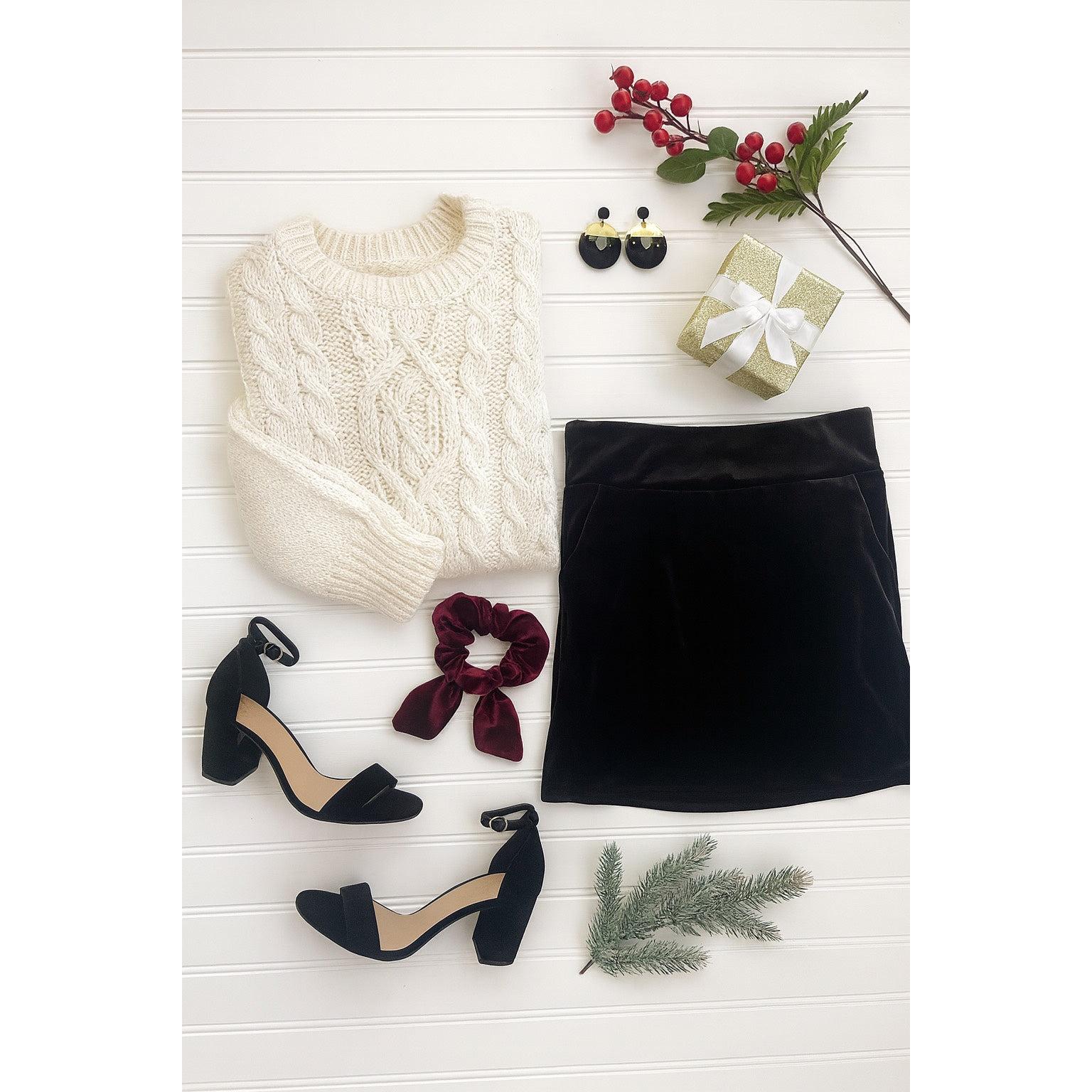 Women’s holiday velvet skirt with elastic waistband, velvet skirt styled for Christmas outfits.