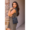 Envelope style crossbody bag with multiple zipper compartments