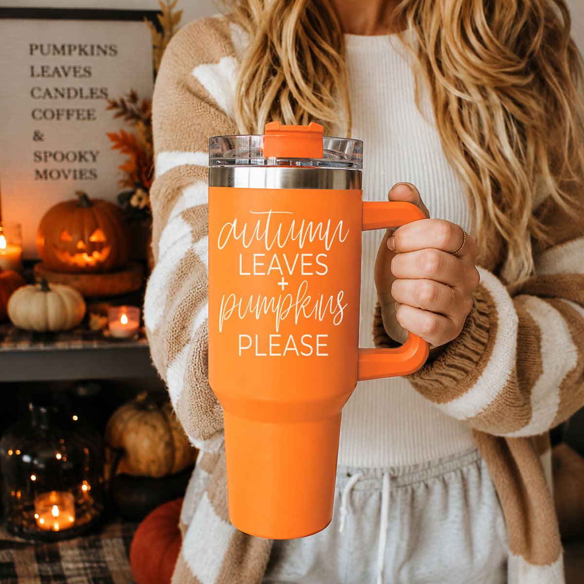 Fall 40oz Tumbler with handle
Celebrate cozy season with this stylish 40oz orange fall tumbler featuring the phrase “Autumn Leaves + Pumpkins Please” in a trendy autumn aesthetic design. 
This insulated stainless steel handled tumbler keeps drinks hot or cold for hours and includes a reusable straw with spill-resistant lid. Perfect for iced coffee, tea, water, apple cider, and pumpkin spice drinks during fall. A fun autumn tumbler gift for moms, teachers, coffee lovers, coworkers, pumpkin patch fans