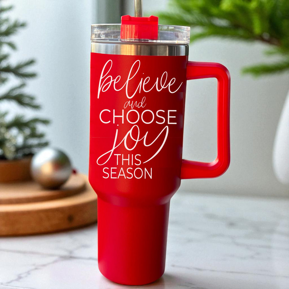 Holiday gift ideas - red Christmas tumbler believe and choose joy message
Christmas tumbler gift for women - 40oz believe and choose joy drinkware
Red holiday tumbler gift - believe and choose joy this season 40oz