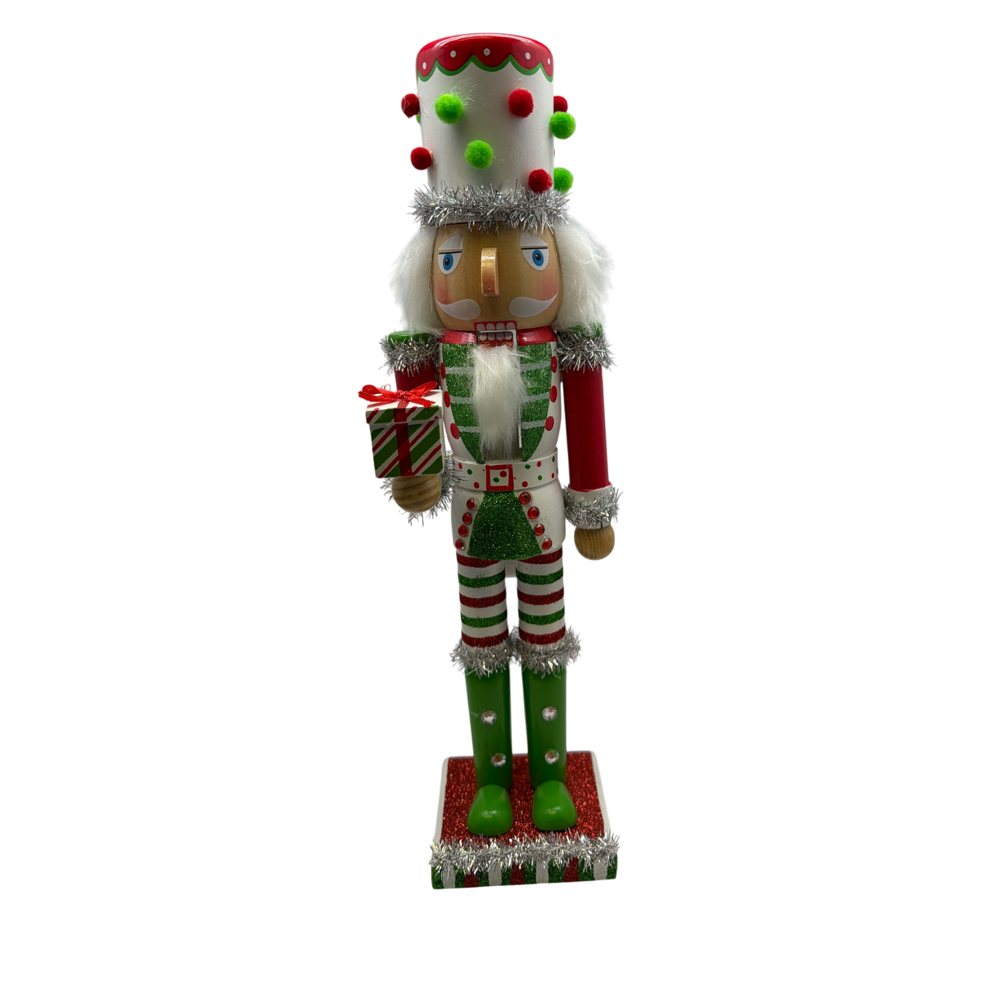 Red White and Green Nutcracker With Polka Dot Pom Pom Hat