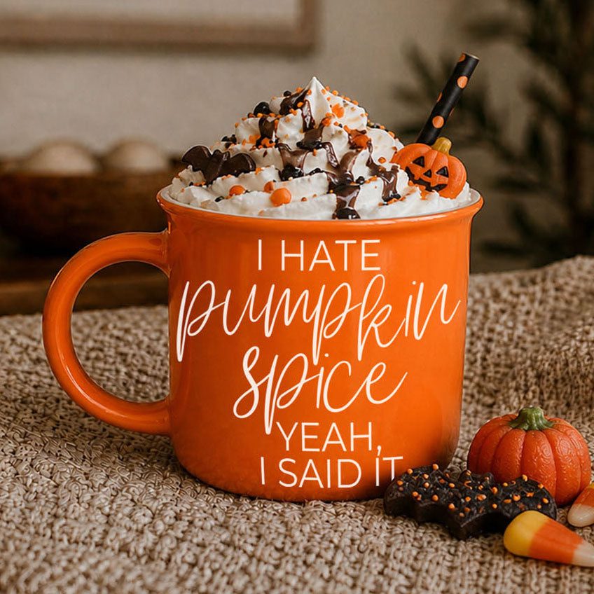 funny fall mug next to caramel drizzle dessert
halloween party coffee station with novelty mug
autumn office setup with laptop and sarcastic mug
orange ceramic mug against rustic shiplap wall
fall themed hot drink station featuring orange mug