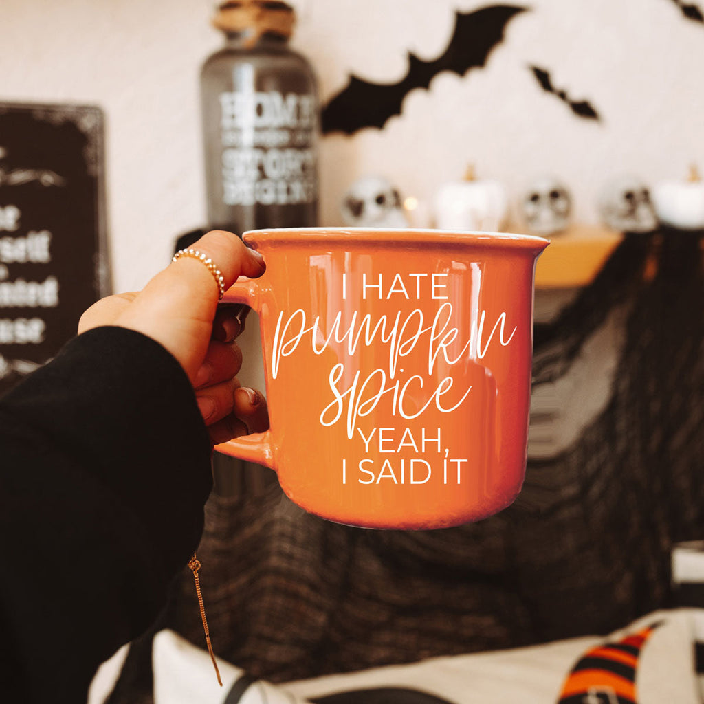 funny fall quote mug in warm toned kitchen
autumn hallway table decor with orange coffee cup
bold orange mug as pop of color in fall decor