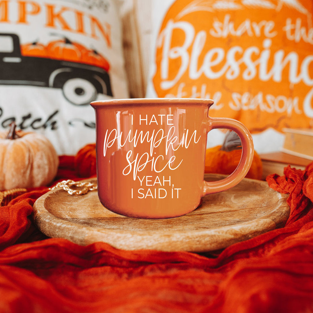 halloween coffee cup with cheeky phrase
autumn drinkware for sarcastic coffee lovers
funny fall mug next to pumpkins and leaves
orange coffee mug in cozy fall flatlay
autumn hallway table decor with orange coffee cup
bold orange mug as pop of color in fall decor
