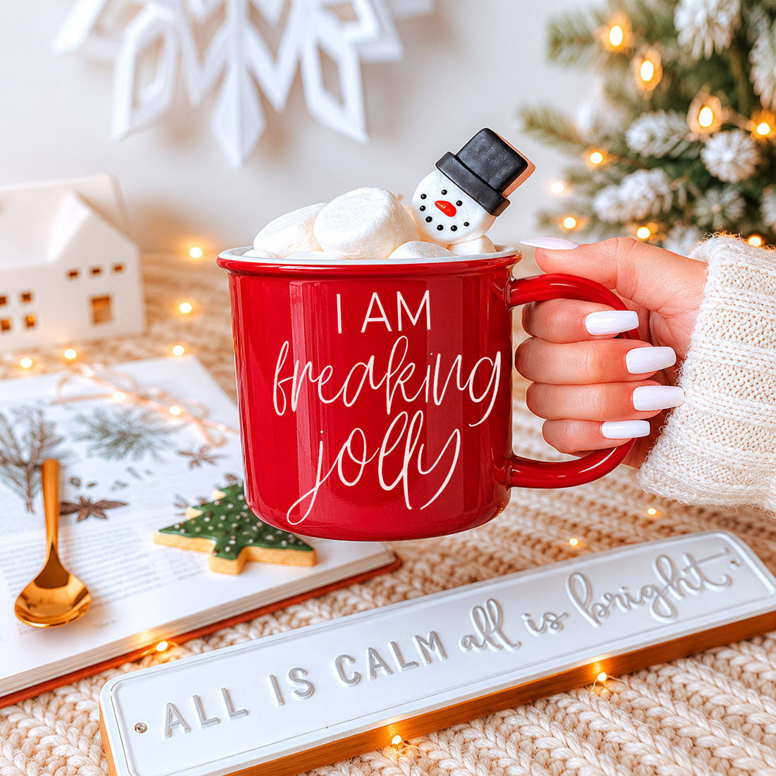 Christmas shelf decor mug
festive home coffee cup
holiday entertaining mug
Christmas party drinkware
woman holding red Christmas mug
Christmas mug with tree background
cozy holiday coffee aesthetic
Christmas morning hot chocolate cup
