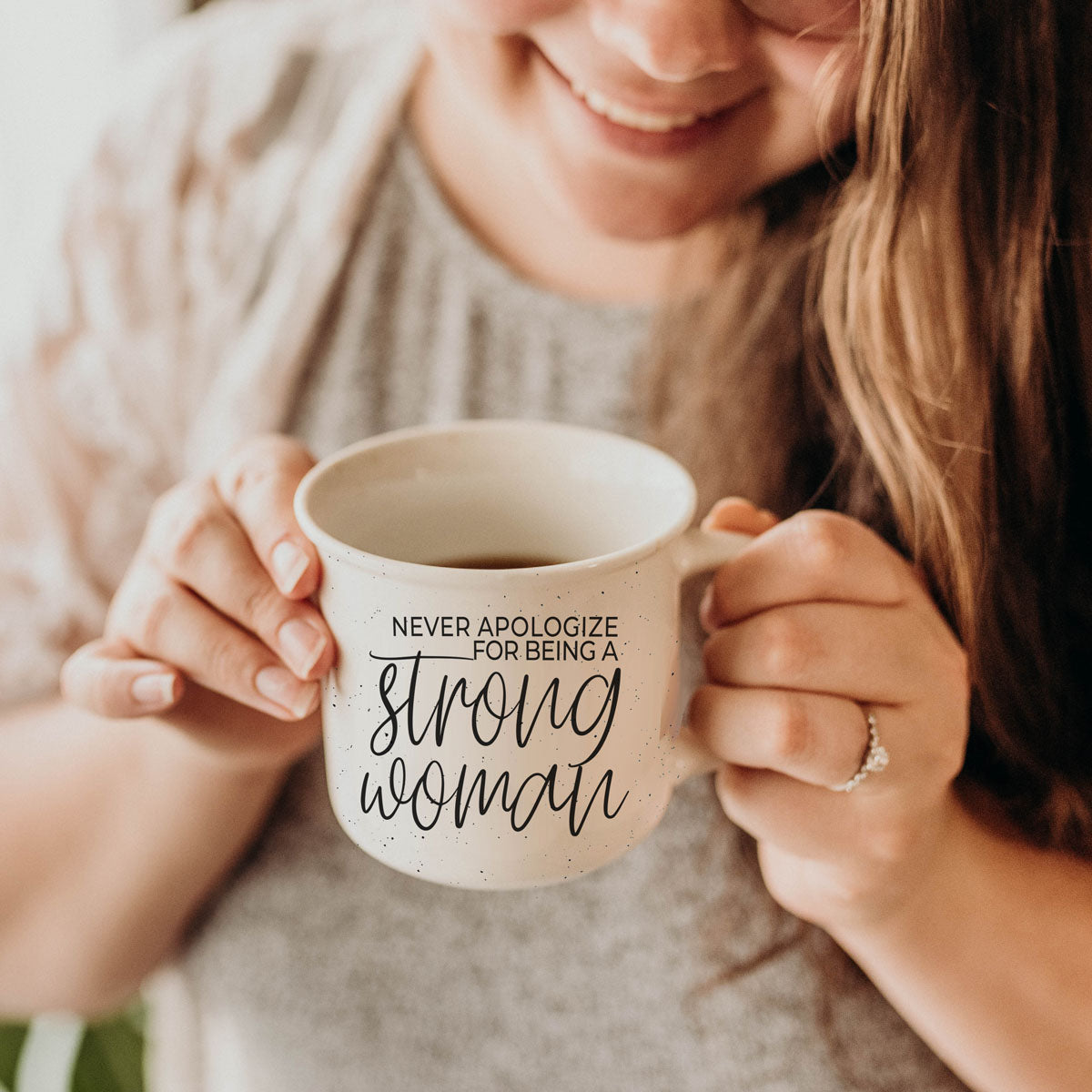 positive affirmation mug for modern women
strong woman mug used in cozy morning scene
trendy neutral coffee mug with feminist message
inspirational drinkware for women’s empowerment
unique gift for confident woman coffee mug